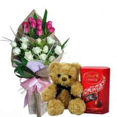 white and pink roses with bear and chocolate