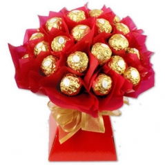 Send 24 pcs ferrero rocher chocolate in a red warped paper